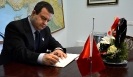 FDPM and MFA I. Dacic signs the Condolence Book at the Turkish Embassy [16/5/2014]