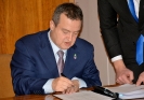 Signing the agreement Minister Dacic and Minister Moscoso