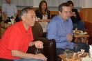 Minister Dacic and Ambassador Li Mancang watch the game of womens finals in volleyball