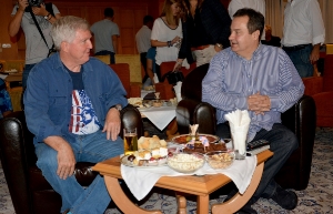 Minister Dacic and US Ambassador Kyle Scott watch the final game of the Olympic Games in basketball