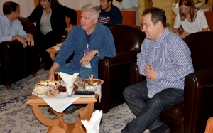 Minister Dacic and US Ambassador Kyle Scott watch the final game of the Olympic Games in basketball