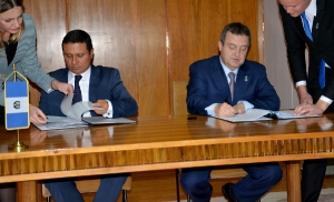 Signing the agreement Minister Dacic and Minister Moscoso