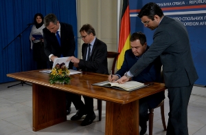 Minister Dacic and Ambassador Dittmann sign agreement